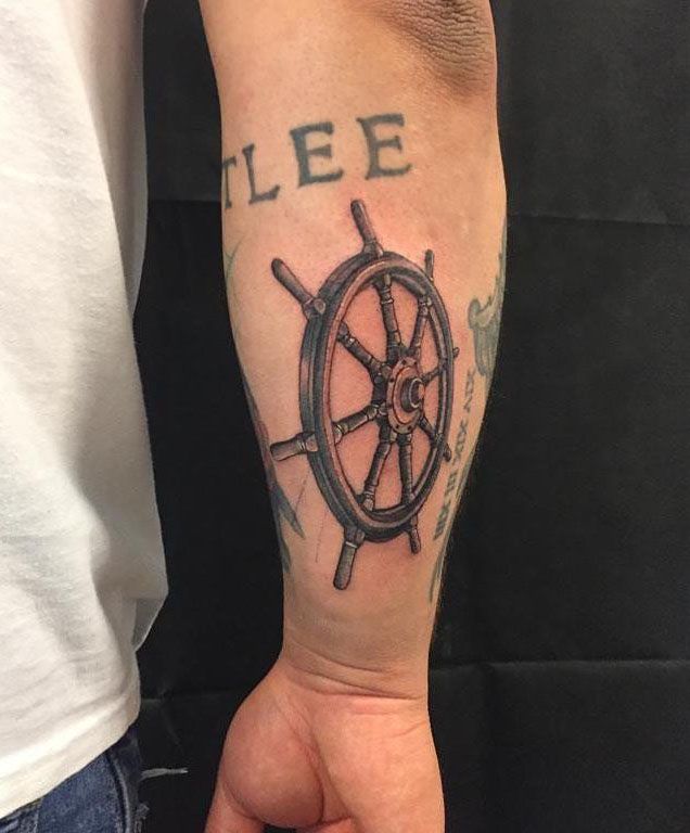 30 Wheel Tattoos Give You The Right Direction