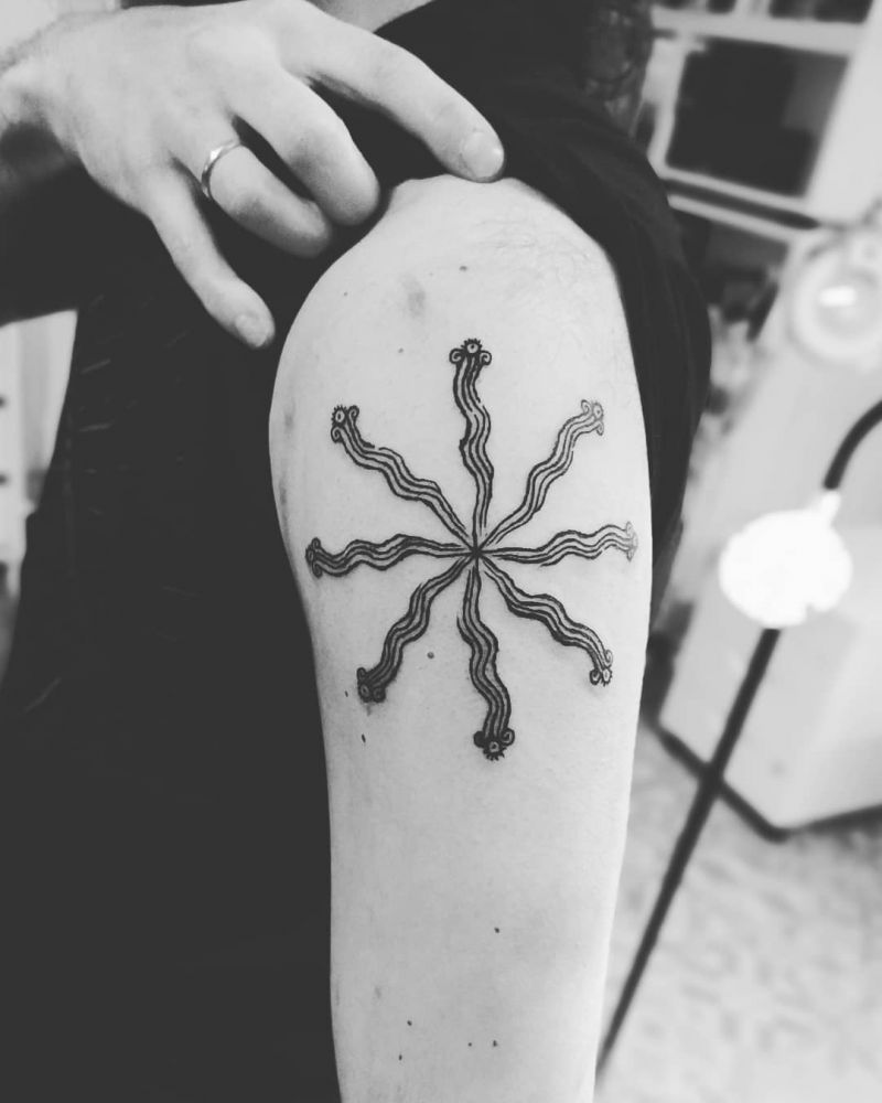 30 Wheel Tattoos Give You The Right Direction