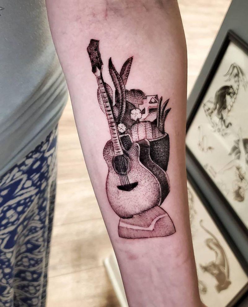 30 Pretty Guitar Tattoos for Your Inspiration