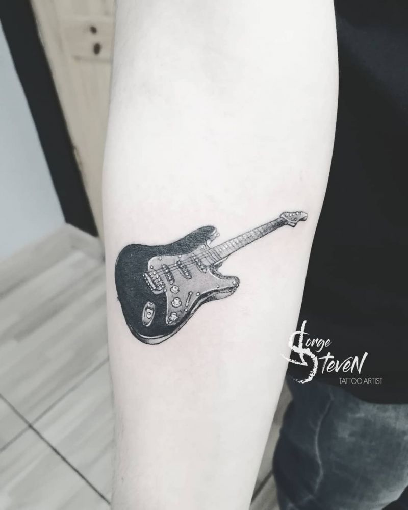 30 Pretty Guitar Tattoos for Your Inspiration