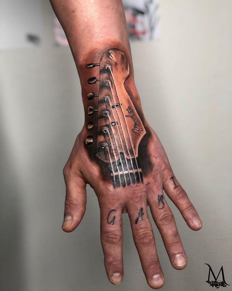 30 Pretty Guitar Tattoos for Your Inspiration