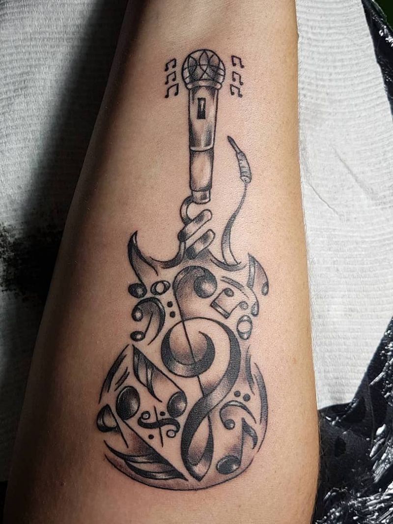 30 Pretty Guitar Tattoos for Your Inspiration