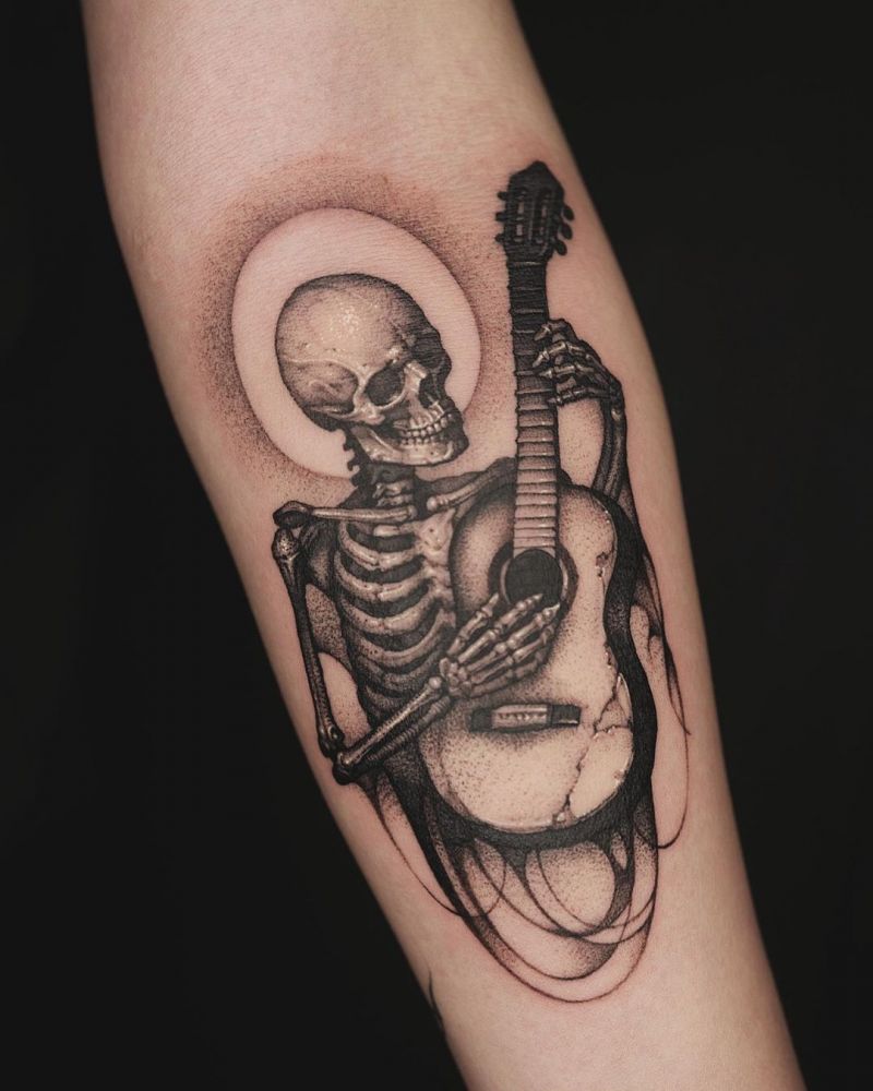 30 Pretty Guitar Tattoos for Your Inspiration