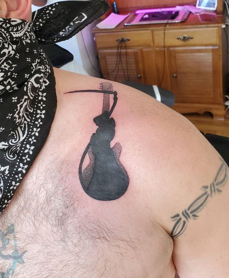 30 Pretty Guitar Tattoos for Your Inspiration