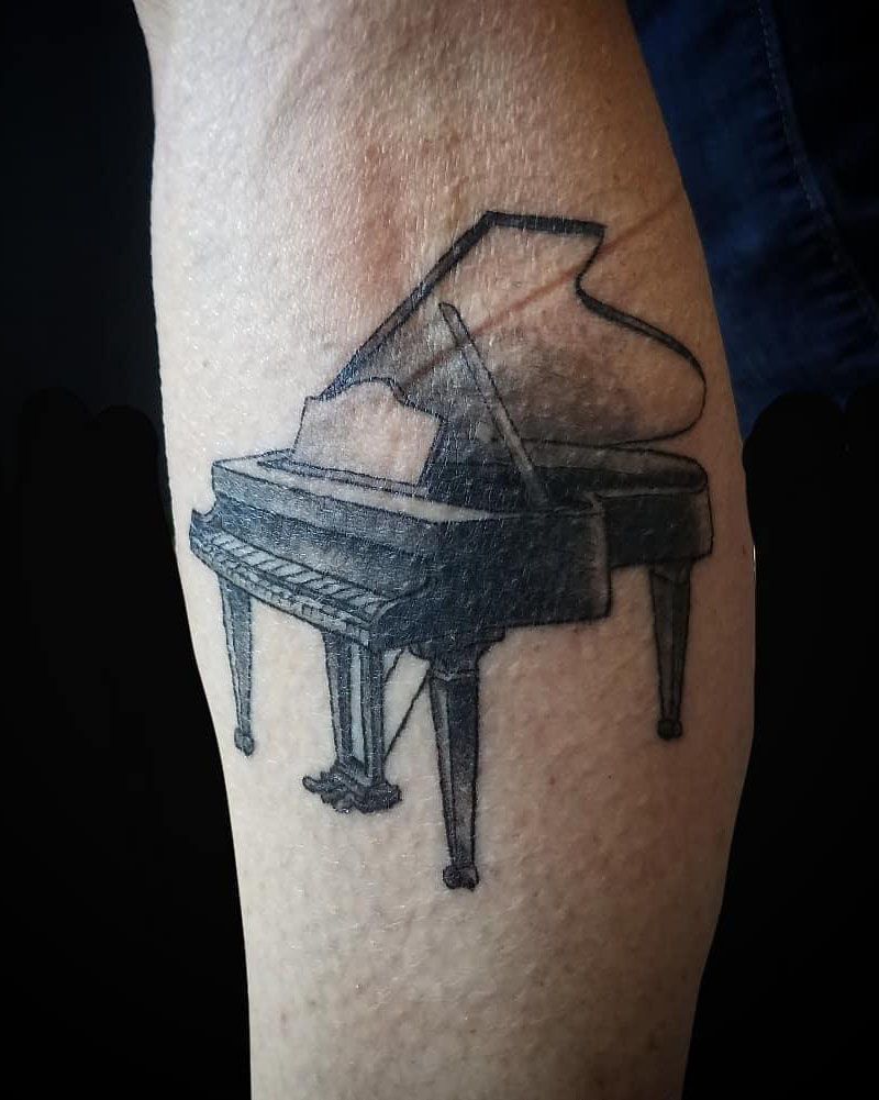 30 Pretty Piano Tattoos You Can't Miss