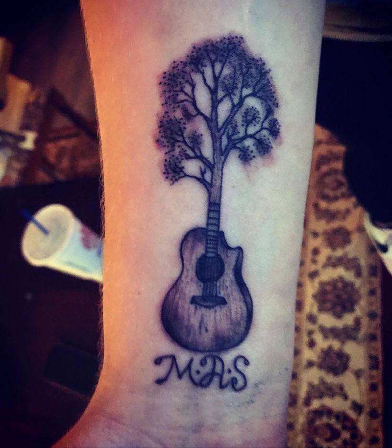 30 Pretty Guitar Tattoos for Your Inspiration