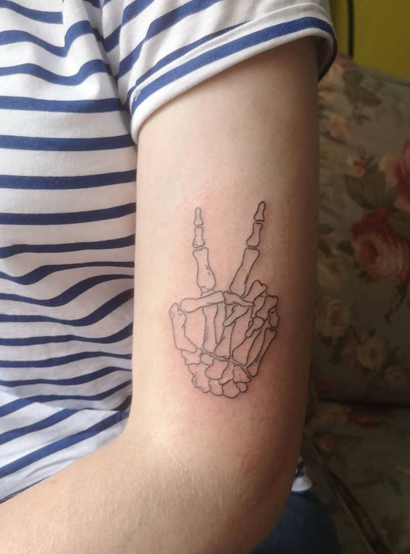 30 Pretty Skeleton Tattoos That You Can't Miss