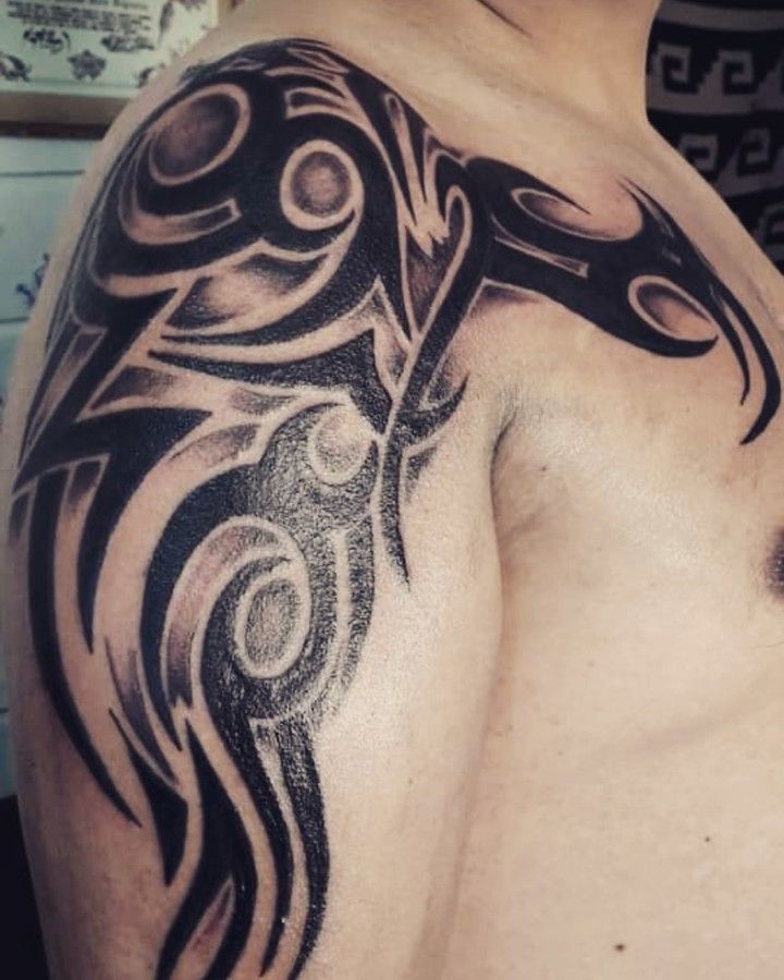 30 Pretty Tribal Tattoos to Inspire You