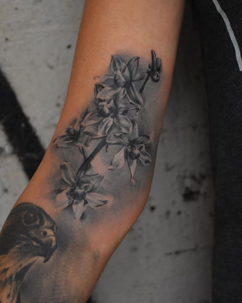 30 Pretty Larkspur Tattoos that Can Enhance Your Temperament