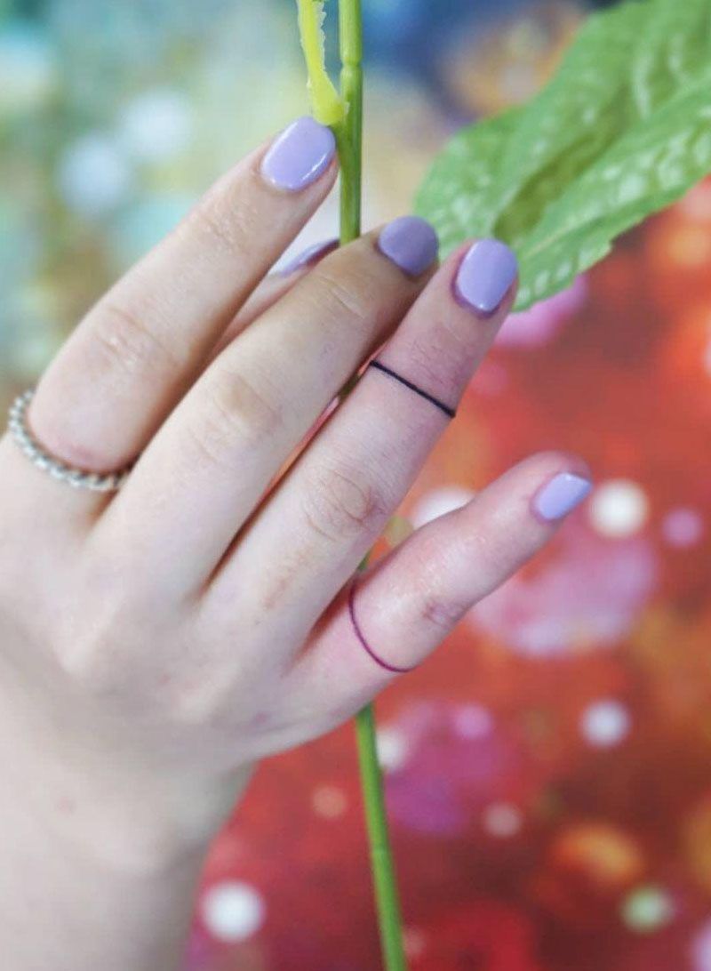 30 Pretty Ring Tattoos You Will Love