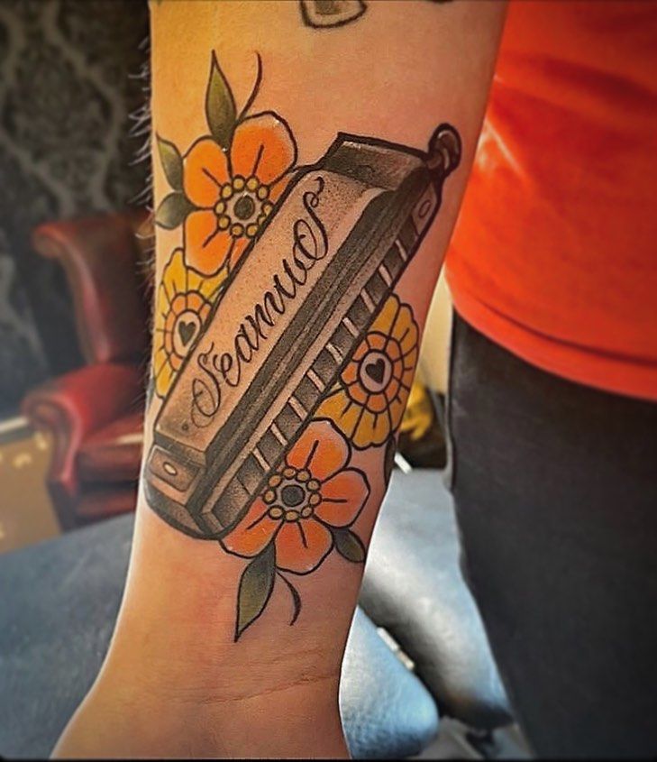 30 Pretty Harmonica Tattoos You Must Try