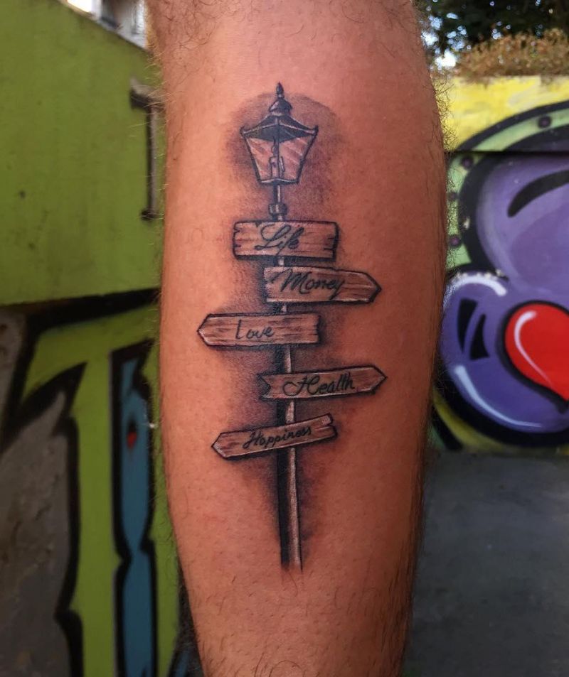 24 Pretty Street Sign Tattoos to Inspire You
