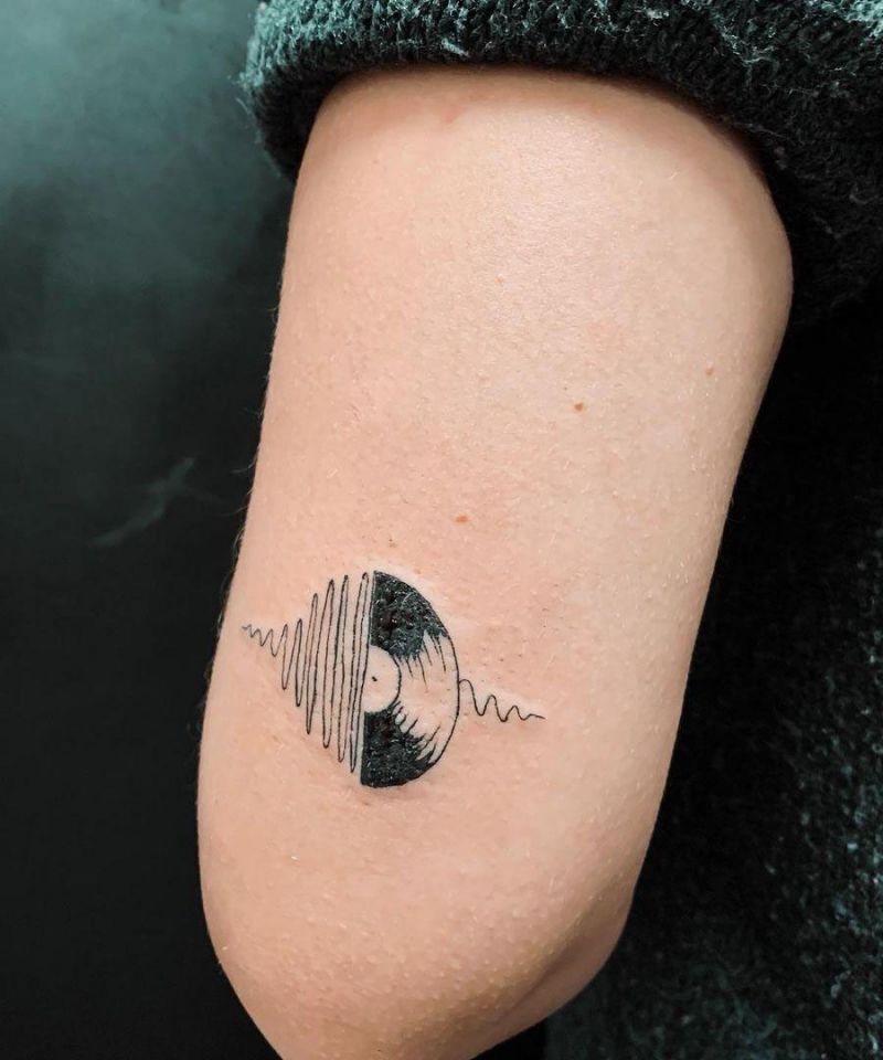 30 Pretty Vinyl Tattoos You Must Try