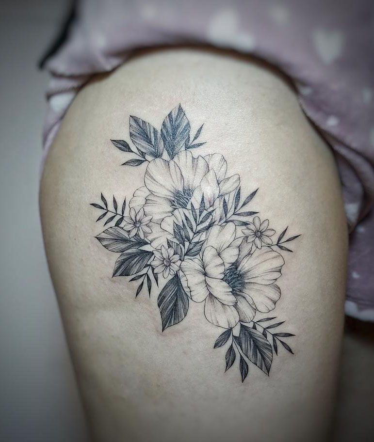 30 Pretty Thigh Tattoos You Can Copy