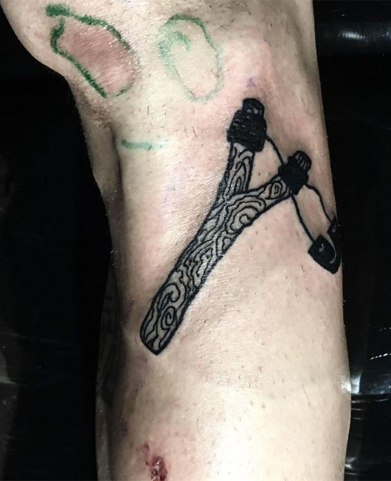 30 Perfect Slingshot Tattoos You Can Copy