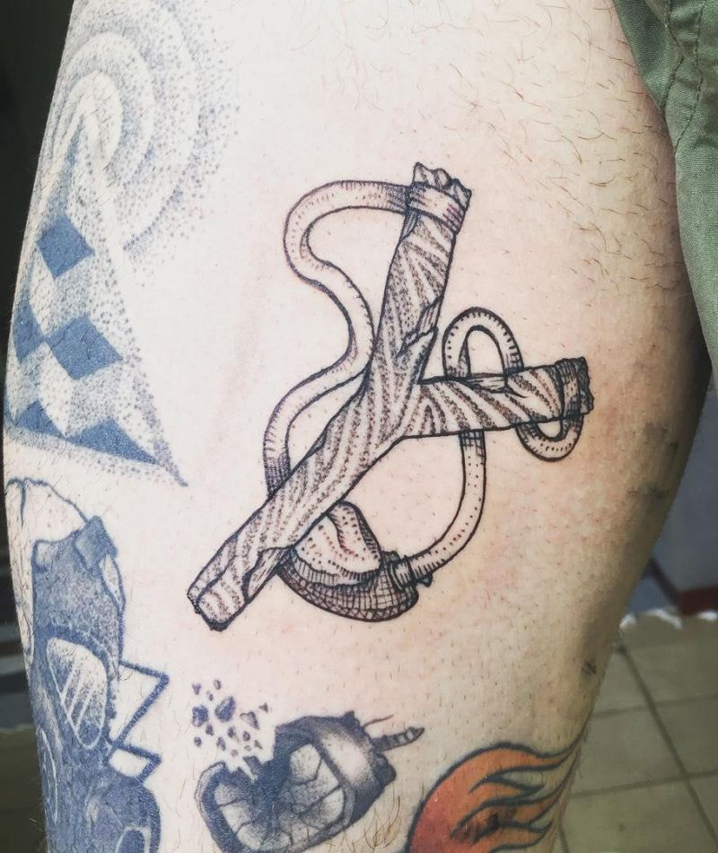 30 Perfect Slingshot Tattoos You Can Copy