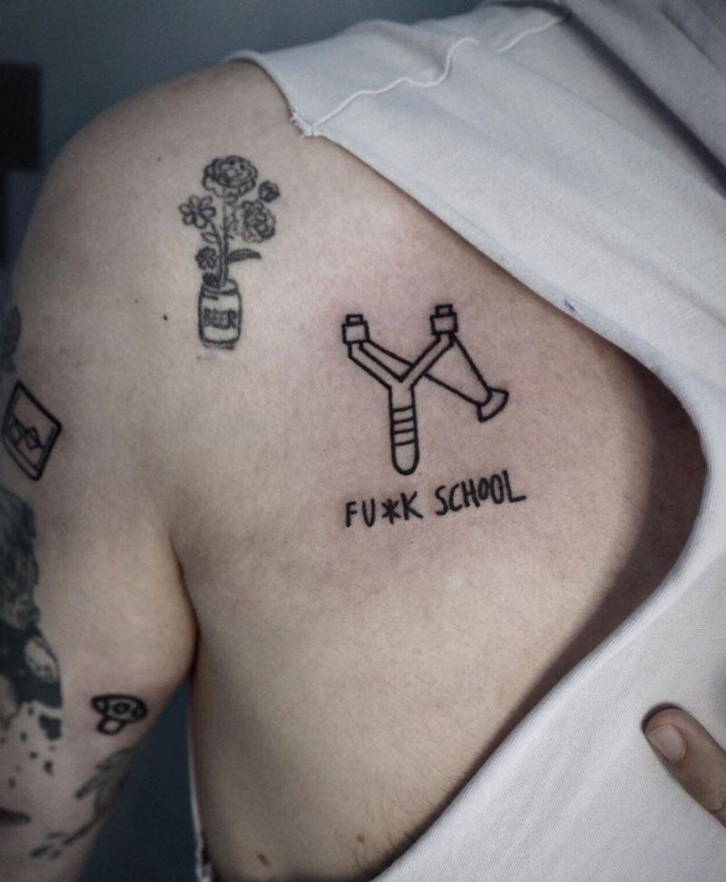 30 Perfect Slingshot Tattoos You Can Copy