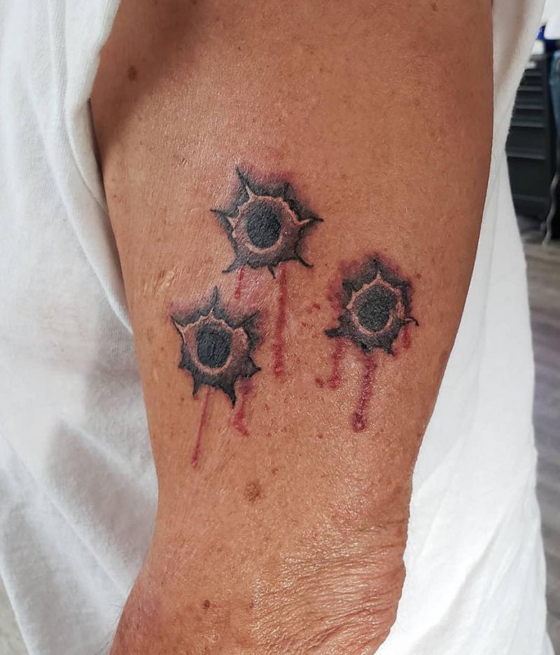 30 Great Bullet Hole Tattoos to Inspire You