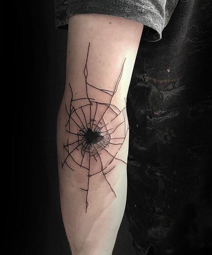 30 Great Bullet Hole Tattoos to Inspire You