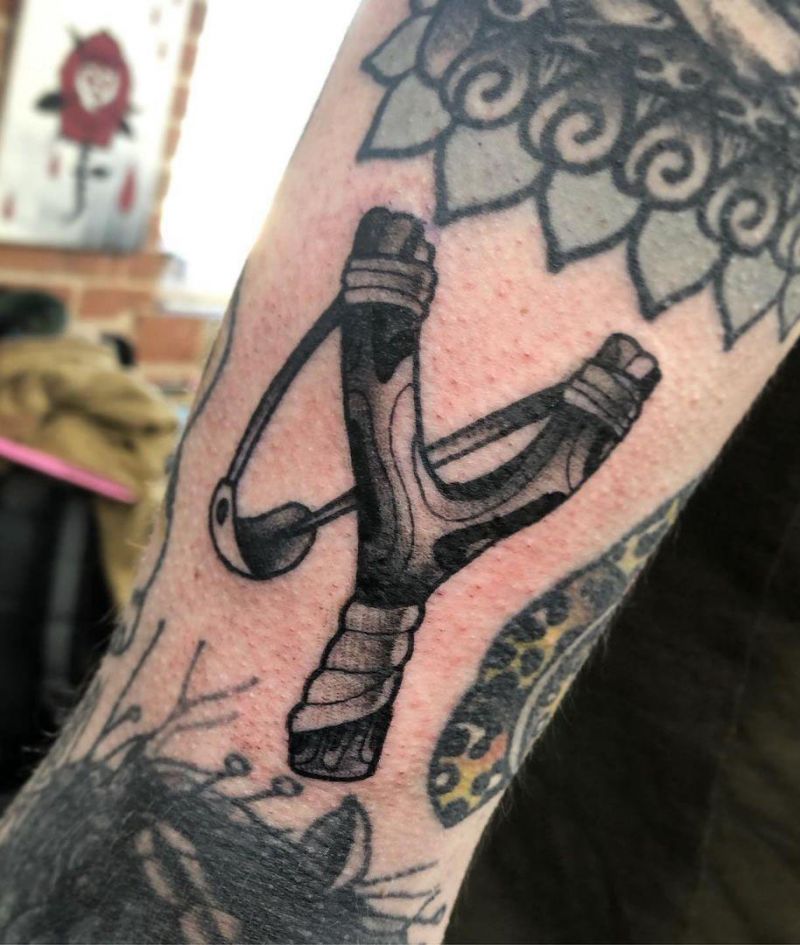 30 Perfect Slingshot Tattoos You Can Copy