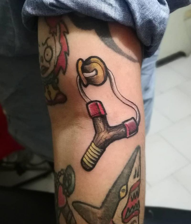 30 Perfect Slingshot Tattoos You Can Copy