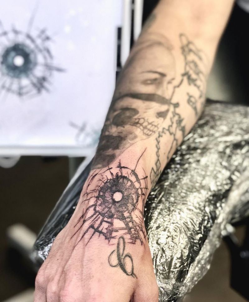 30 Great Bullet Hole Tattoos to Inspire You