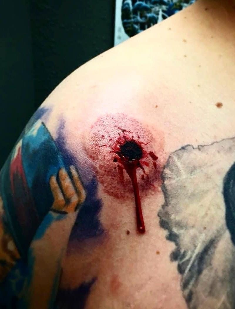 30 Great Bullet Hole Tattoos to Inspire You