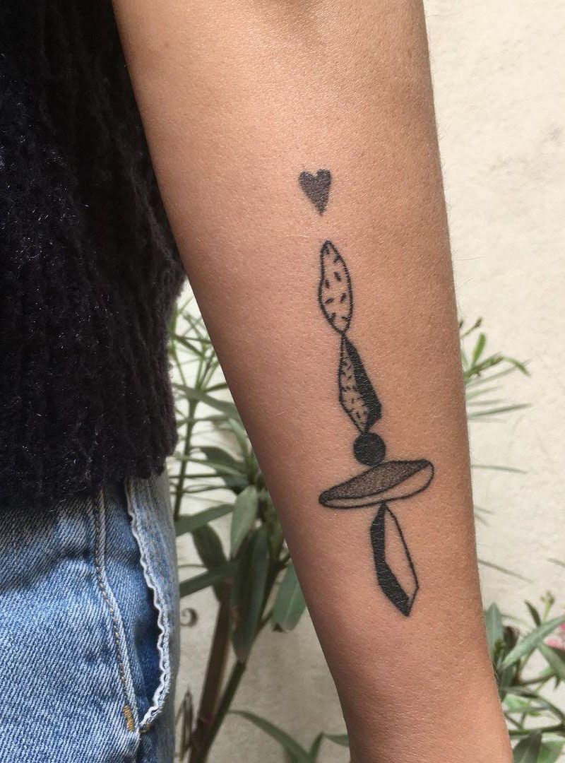 30 Elegant Stone Tattoos for Your Inspiration