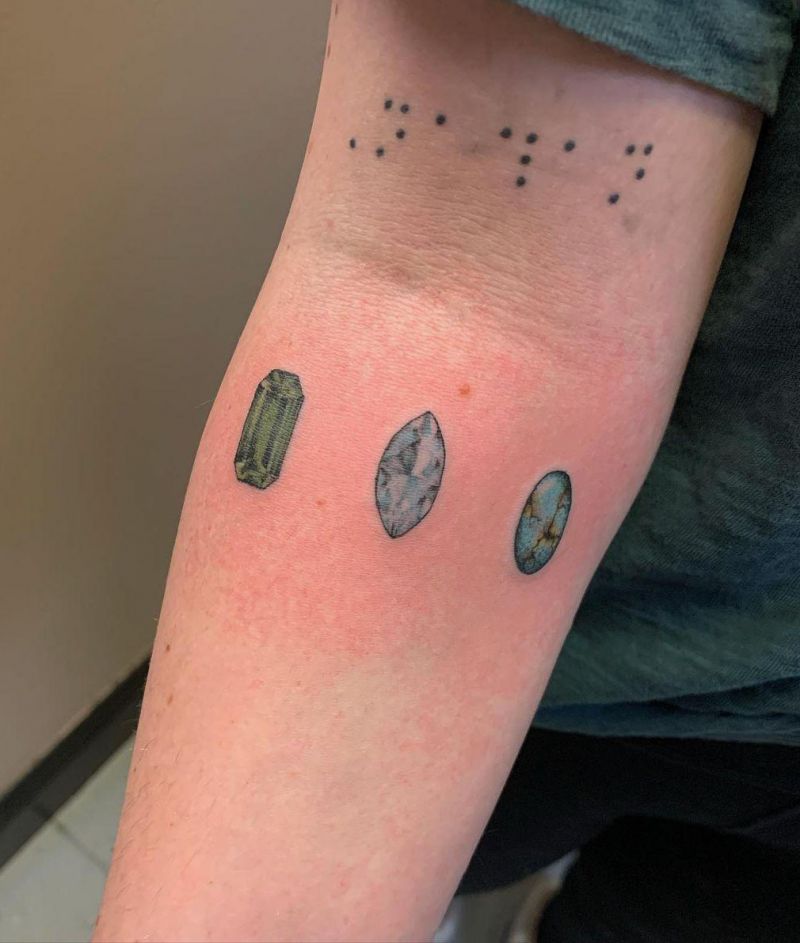 30 Elegant Stone Tattoos for Your Inspiration