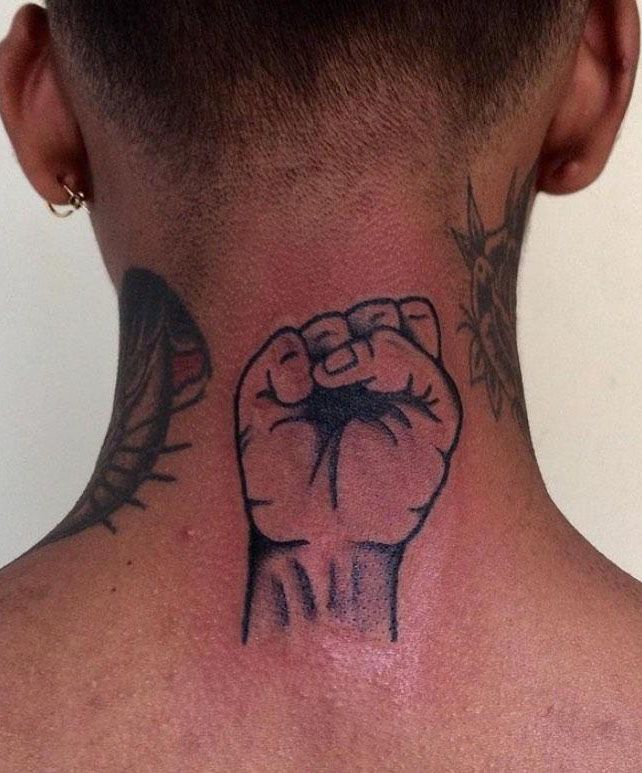 30 Pretty Raised Fist Tattoos to Inspire You