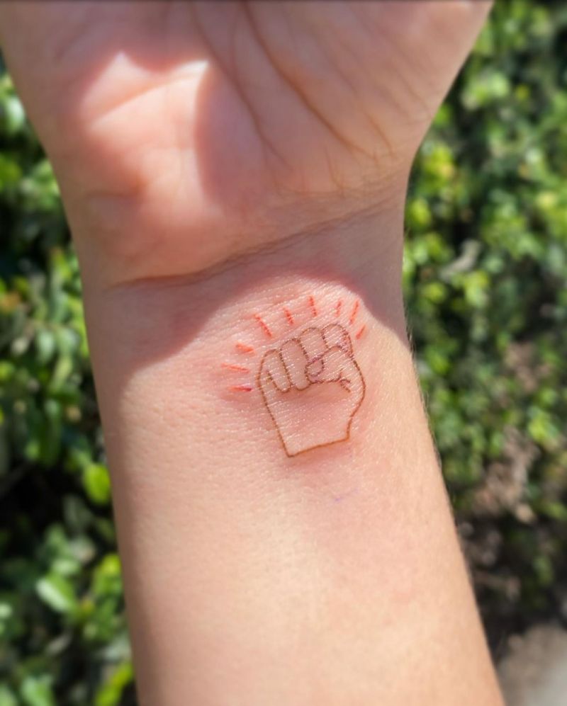 30 Pretty Raised Fist Tattoos to Inspire You