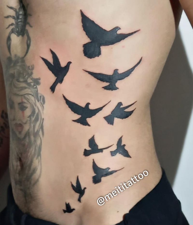 30 Pretty Flying Birds Tattoos to Inspire You