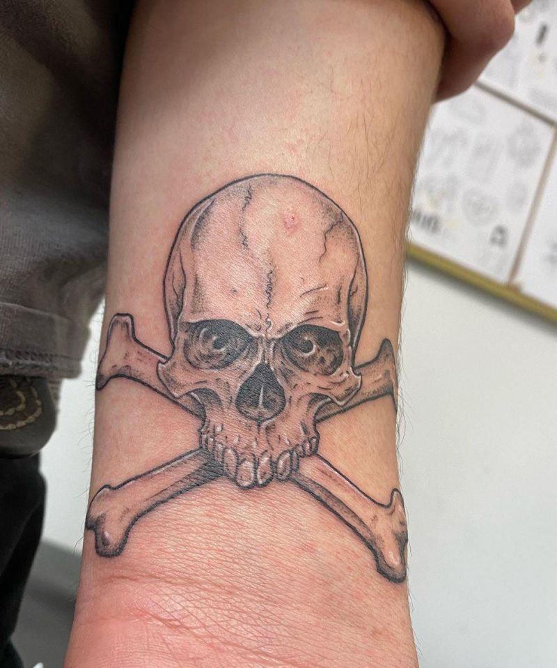 30 Gorgeous Skull and Crossbones Tattoos You Can’t Miss