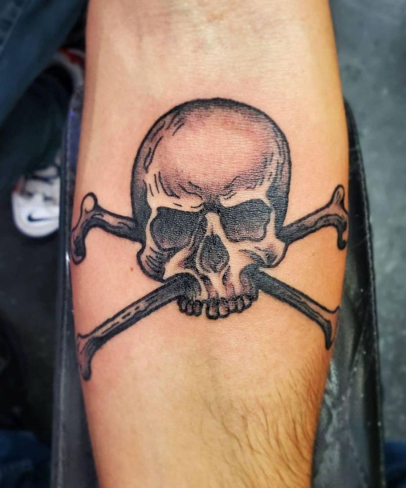 30 Gorgeous Skull and Crossbones Tattoos You Can’t Miss