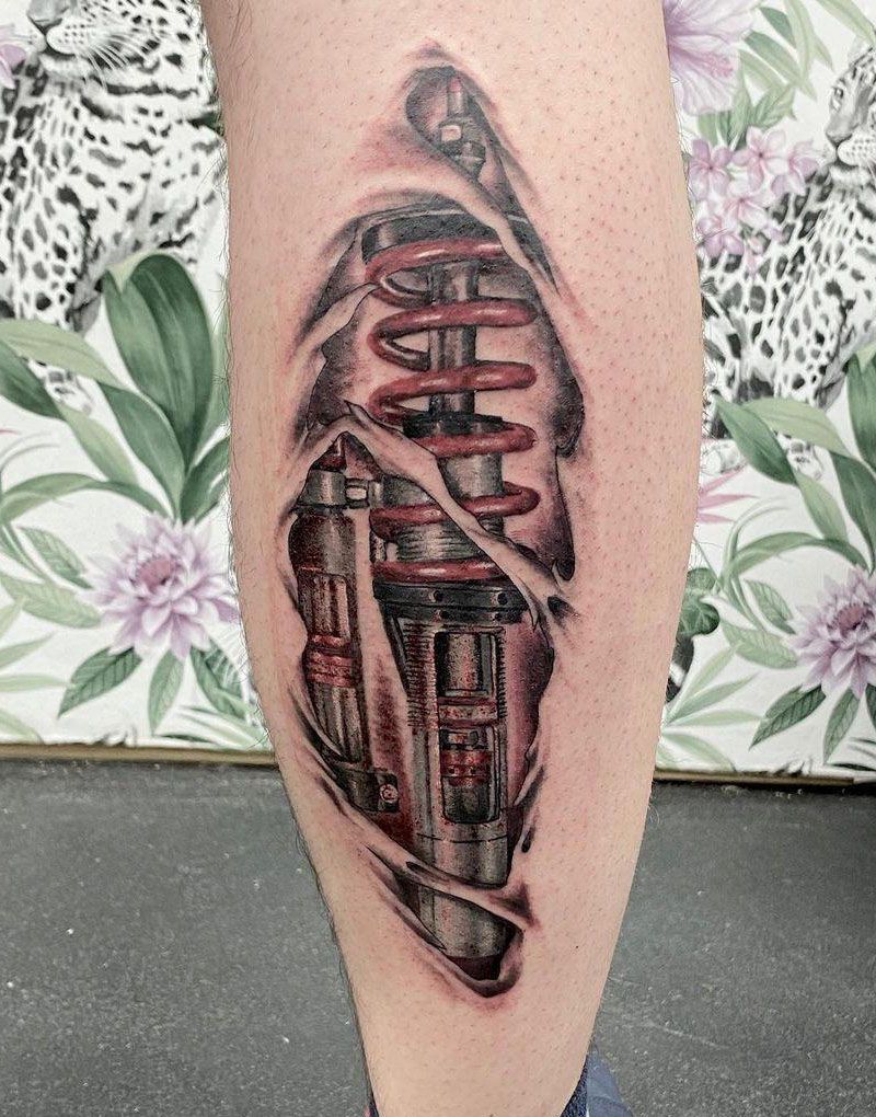 30 Wonderful Shock Absorber Tattoos You Must Love