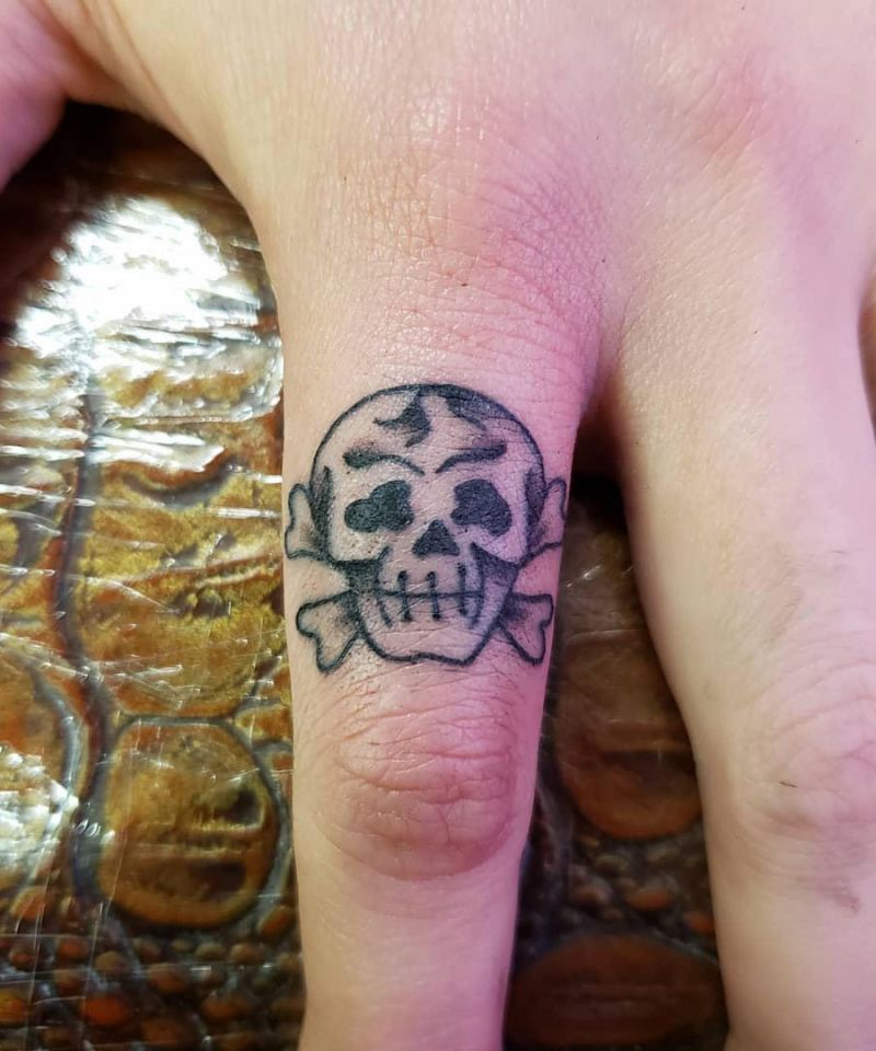 30 Gorgeous Skull and Crossbones Tattoos You Can’t Miss