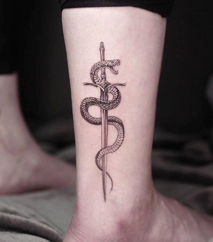 30 Pretty Snake and Sword Tattoos You Will Love