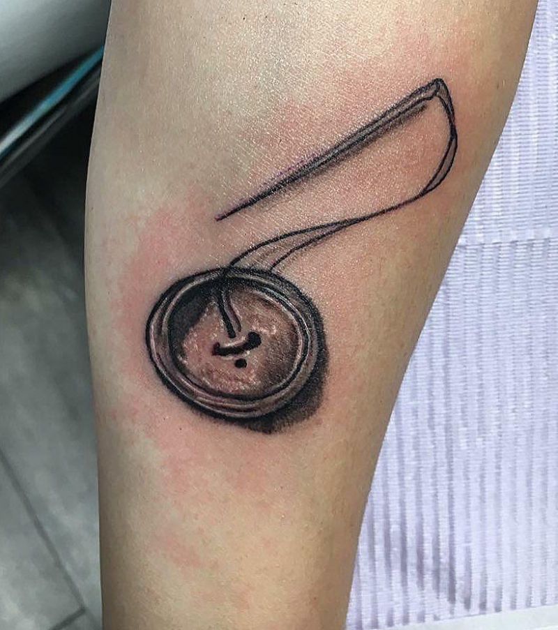 30 Unique Button Tattoos For Your Next Ink