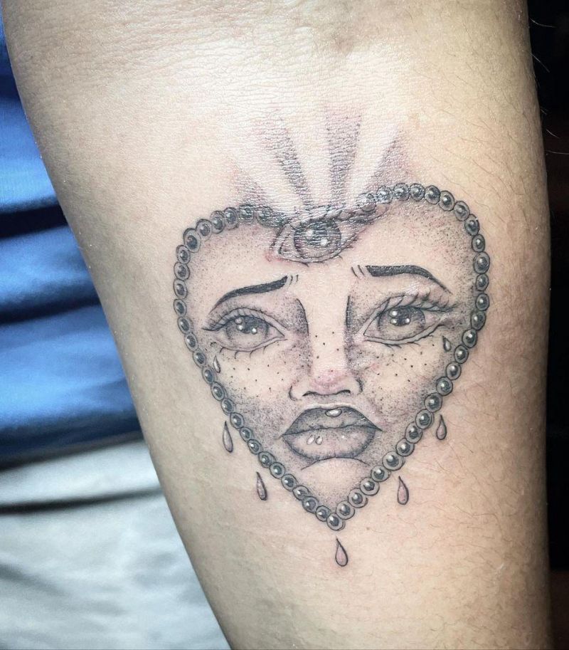 30 Unique Crying Heart Tattoos for Your Inspiration