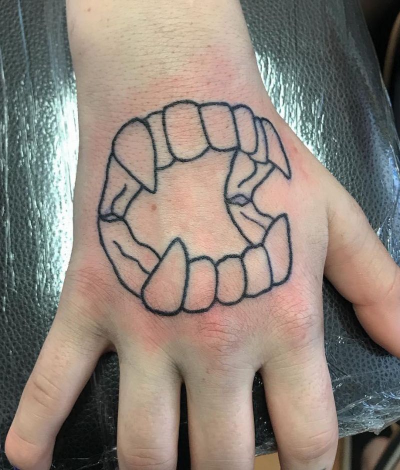 30 Unique Vampire Fang Tattoos You Can't Miss