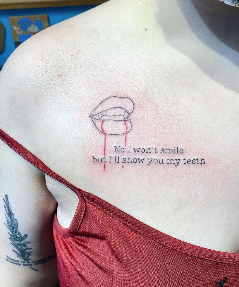 30 Unique Vampire Fang Tattoos You Can't Miss