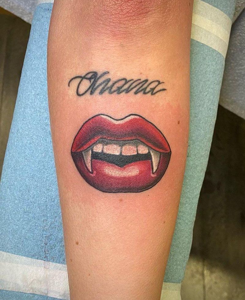 30 Unique Vampire Fang Tattoos You Can't Miss