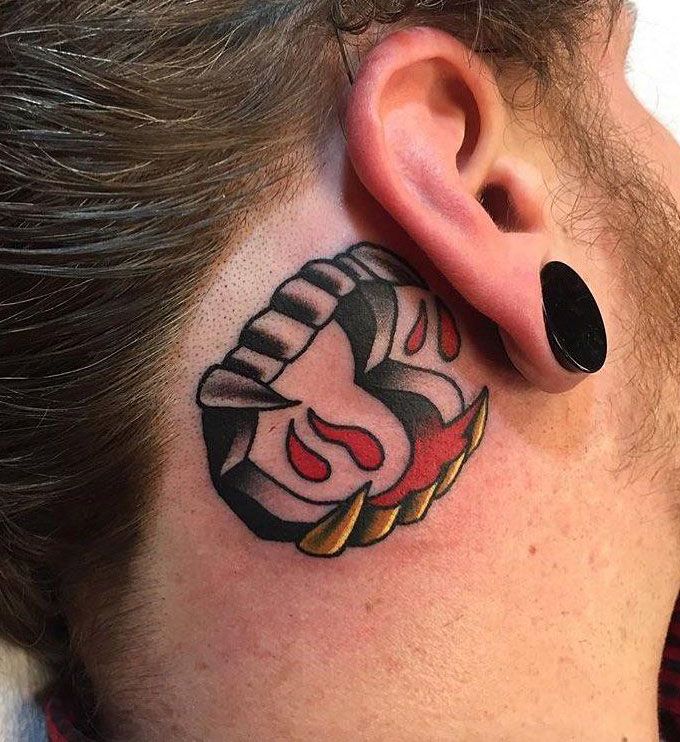 30 Unique Vampire Fang Tattoos You Can't Miss