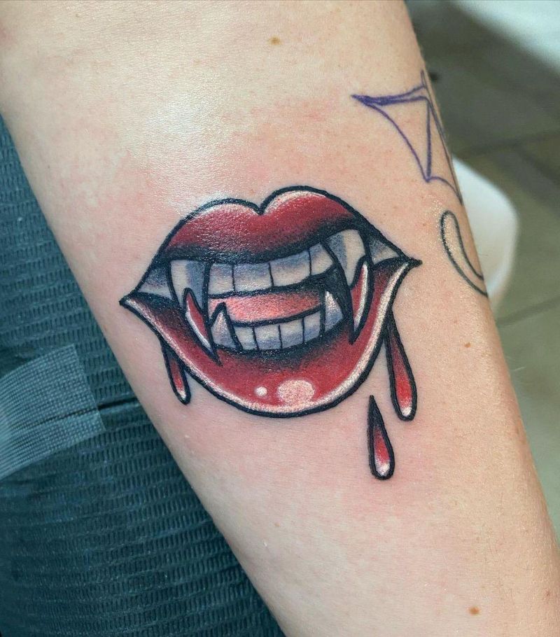 30 Unique Vampire Fang Tattoos You Can't Miss