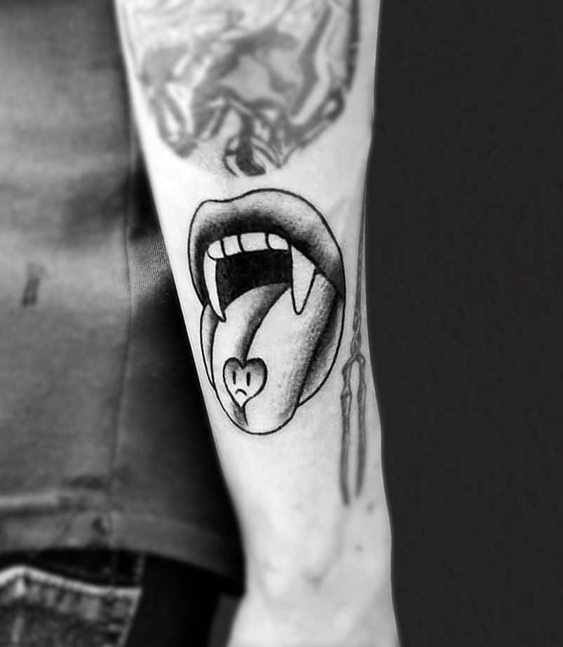 30 Unique Vampire Fang Tattoos You Can't Miss