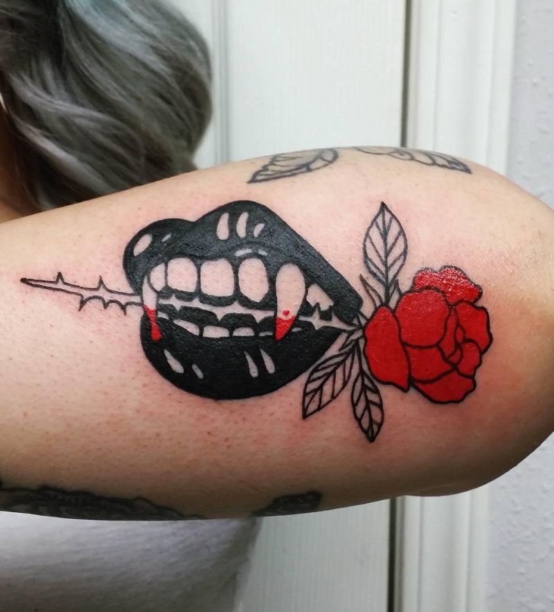 30 Unique Vampire Fang Tattoos You Can't Miss