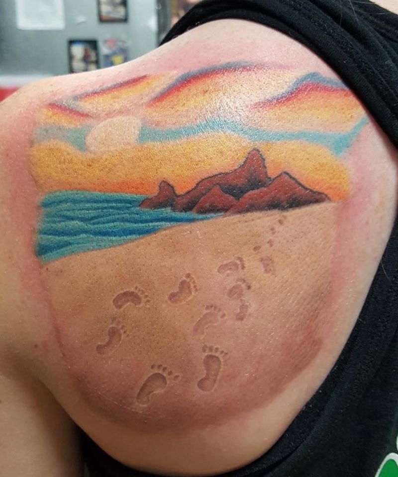 10 Unique Footprints In The Sand Tattoos to Inspire You