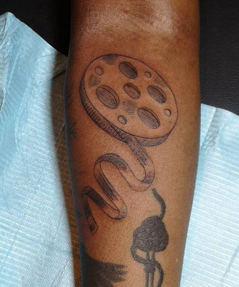 30 Exciting Film Reel Tattoos For Your Inspiration