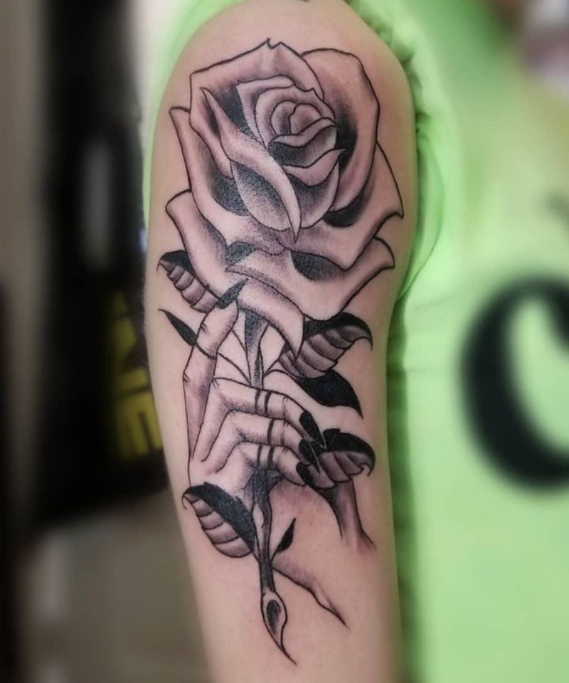 30 Unique Hand Holding Rose Tattoos You Must Love