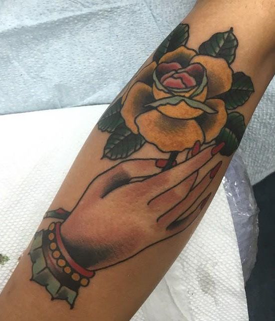 30 Unique Hand Holding Rose Tattoos You Must Love